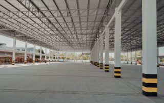 Industrial warehouse building with concrete foundation